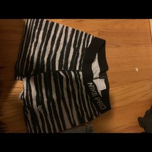 2 pairs of nike spandex. $8 each or 14 for both